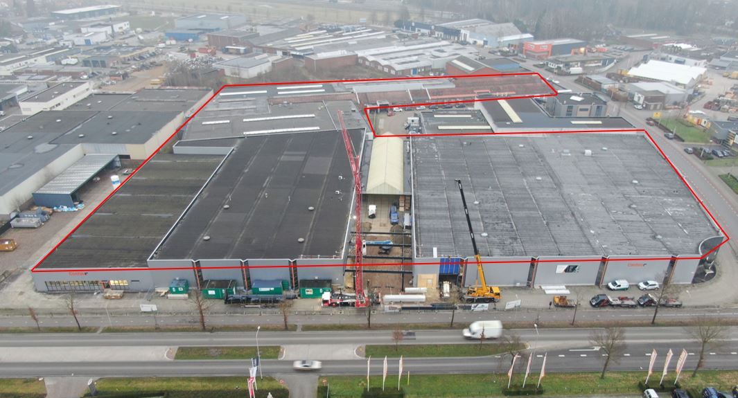 Aerial view of the Contour site with a red line around the buildings