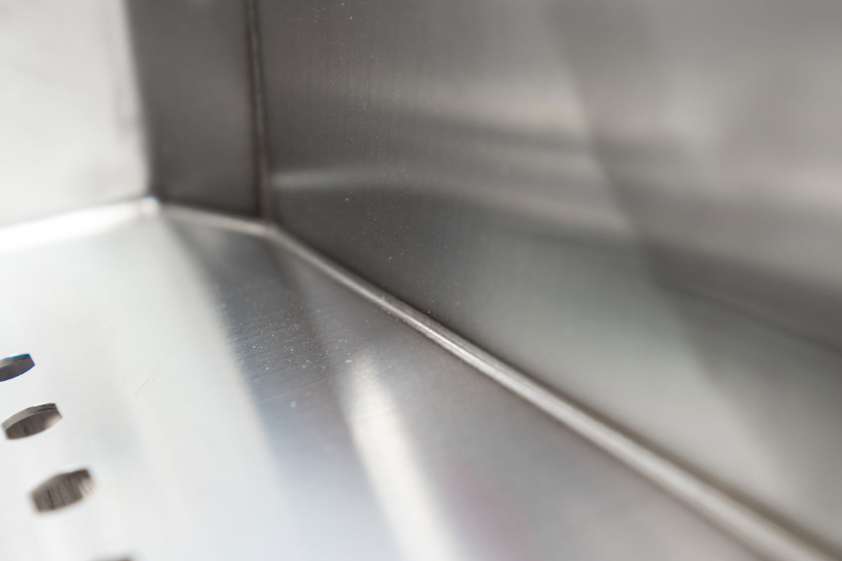 Handheld laser weld on an inside corner