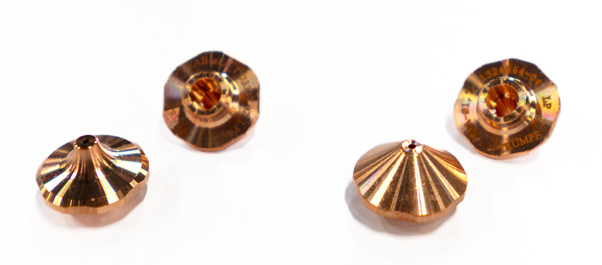 Nozzles for laser cutting